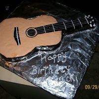 Chuck's Guitar Acoustic guitar done in fondant. Some details in buttercream