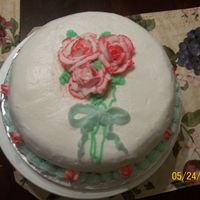 101_0571.jpg I made this cake as my course 1 final/ mother's day cake. I had trouble with my roses but other then that I liked this cake