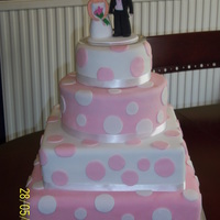 Pink And White Wedding Cake The bride wanted square and round cakes also pink and white, bottom tier is fruit, second is chocolate and the rest was vanilla. I made the...