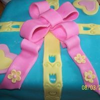 My Fondant Class Final Didn't turn out as well as I wanted, but HAD to attempt a square cake.Gonna have to really work on learning how to make the bows...I...