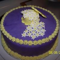 My Dd's Fondant Class Final Fondant covered, Gumpaste pillbox and flowers, buttercream borders. I'm pretty proud of her, she did a great job!