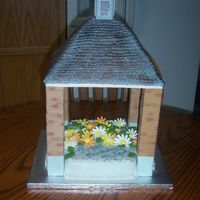 Gazebo This cake was made to mimic pictures I was given of a Gazebo...For a 90th B/day party held under the very Gazebo... The roof is Devils food...