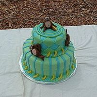 Monkeys!!! A monkey themed cake for an 8 year old's birthday that loves monkeys! The cake and icing were both vanilla. The diamonds, stripes, and...