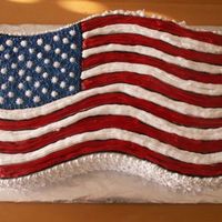 American Flag Chocolate cake layers filled with chocolate custard. Buttercream Stars & Stripes.