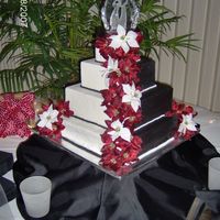 Black And White This cake was really a fun idea difficult to produce but I love the half black half white fondant.