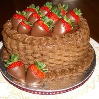 Chocolate Berry Basket This is a triple chocolate cake with chocolate syrup frosting filling and crumb coat, and chocolate buttercream basketweave.