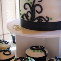 Funky Cupcakes Vanilla cupcakes with vanilla fondant accents. These were a LOT of work lol, but loved the finished product :)