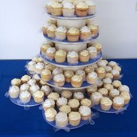 Wedding Cupcakes Wedding cupcakes on a stand I built myself using cake dummies, cake boards, scrapbook paper & ribbon. Handmade fondant flowers &...