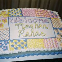 Quilt Baby Shower Cake This is a half sheet baby shower cake done in a quilt like design.