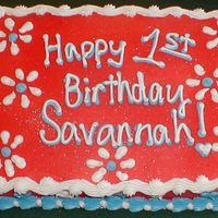 First Birthday I used the Wilton color spray to get the cake red. It was designed to match their Raggedy Ann & Andy theme.