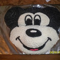 Mickey Made for a friend's 3 year old son. Didn't have a cake pan for Mickey, so I had to free hand him. I had to carve and mold the...