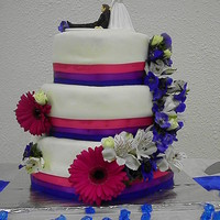 Wedding Cake For Vickie I made this cake as a wedding present for my daughter's closest friend. They loved the cake.