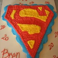 Superman Cupcake Cake A cake for my son's 20th birthday....! for all those mothers of young children out there, don't thinkthe theme cakes stop in...