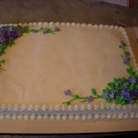 12082295266454.jpg a simple slab cake for a friend. bc icing with royal icing flowers