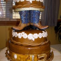 100_2025.jpg OUR FIRST WEDDING CAKE. IT WAS A WESTERN THEME.