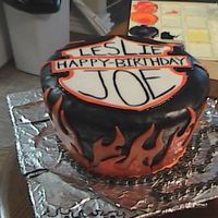 Harley Birthday Cake! harley cake for my moms boyfriend. flame job and the bike chain was a neat addition. enjoy!