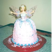 Swan Lake Barbie Cake Strawberry cake5 tiersA real Swan Lake Barbie doll- her wings lit up.