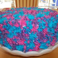 A Mess Of Flowers I asked my sister what colors she wanted on her cake and she said she just wanted a purple, pink and blue one. So that's what I made...