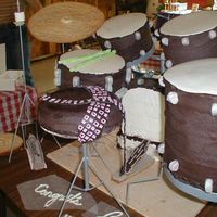Drum Set Cake This was a graduation gift for a friend of mine. You can see where the bass drum suffered from the drive to deliver the cake! I used...