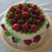 Fresh Strawberry Decorated Cake Fresh strawberries decorate the top and sides of this chocolate cake, frosted with vanilla buttercream. Fresh strawberry buttercream...