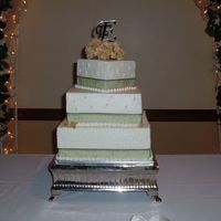 Square Wedding Cake Cake I did today. 12", 10" and 6". The 6" looks like it goes down a bit on the right, but it honestly didn't look...