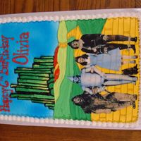 Wizard Of Oz Buttercream background with edible image of characters.