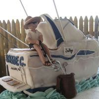 Boat / Golf Cake Ii This cake was a gift for my cousin's 50th birthday. I've never done anything bigger than an 8" round because I'm really...