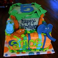 Jungle Boy Jungle Theme in buttercream with Fondant animals and accents.