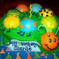 Caterpillar Fondant Cake Buttercream base with individual caterpillar sections covered with fondant.