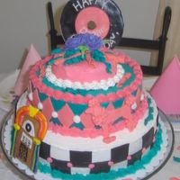 50's Theme Birthday Cake This cake was a first for me in many ways...first stacked cake, first time with fondant, and my first cake outside of Wilton Course I. It...