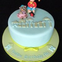 Abi's 2Nd Birthday Cake Round cake with noddy and tessie bear figures and toytown buildings