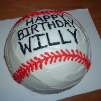 Baseball Cake Dome cake made like a baseball with ice cream centre.