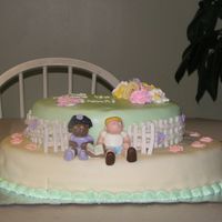 Kindergarten Teacher Retirement Cake i decided to make a play on the word kinder"garden"- i made it all out of fondant- the cake was a hit! no-one wanted to cut it...