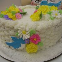 Course 2 Final Cake This is my course 2 Final cake - class buttercream with royal icing flowers and color flow birds. The one bird is hiding on the front of...