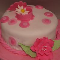 Fondant & Gumpaste Course Final Cake This is my favorite cake to date. Yellow cake with buttercream icing covered in fondant with fondant/gumpaste accents.