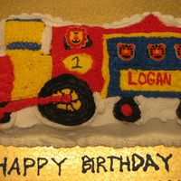 Birthday Train 1st birthday cake for my nephew. I was up all night the night before decorating the cake. My mom and sister had the cake made and...