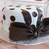 Polka Dot Cake Bow made in Fondant... made to match a belly cake I made...