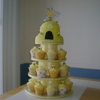 Beehive Cupcake Tower 30 Cupcakes, half chocolate, half vanilla. Beehive is a chocolate fudge cake, filled with chocolate frosting, iced in buttercream and...