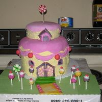 Strawberry Shortcake's House I made this for my daughter first birthday. I appologize for the pizza box. She did not mind though.