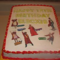 High School Musical 3 This is half choc. half yellow cake. All done in buttercream, with edible images.