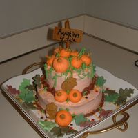 Pumpkin Spice Cake Pumpkin Spice Cake with Cream Cheese Icing, Pumpkins anf Post are maded of fondant, BC for everything else