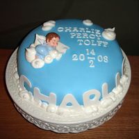 A Cake For Charlie Our friends were having a "nam-giving"party for their son Charlie and I was asked to make a cake. My friend liked the one i made...