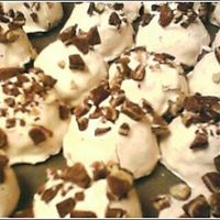 Cake Truffles 1st time making cake truffles. kahlua chocolate cake w/ peppermint cream cheese buttercream and chocolate chips, dipped in white chocolate...