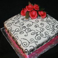 70Th Birthday Cake I made this cake for my grandmother's 70th birthday. I wanted to keep it simple and elegant like her. It is a red velvet cake covered...