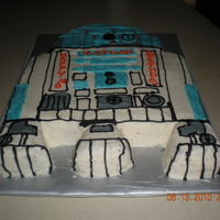 R2D2 Cake Chocolate cake with buttercream frosting.
