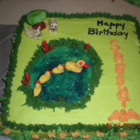 Pond Cake 12" vanilla cake with decorations in candy clay.