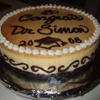 Cheesecake For Phd Graduation This was for a friend who hates cake, but loves cheesecake. This was my first cheesecake. I wanted to celebrate his PhD and couldn't...