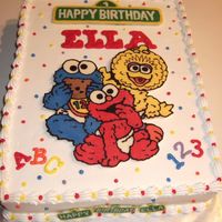 Baby Sesame Street Cake For my niece's first birthday...this was my first chocolate transfer. I used candy melts for the characters and the street signs on...
