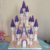 Princess Castle Cake Castle cake for 3 year old's Cinderella Princess party. Used Wilton's castle cake kit. One of the easiest cakes I've made....