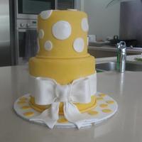 Polka Dots And Bow A small cake for my niece who turned 10. 6 inch and 4 inch tiers, chocolate cake with chocolate ganache, covered in sugarpaste with...